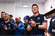 16 December 2023; Joe McCarthy of Leinster, and his brother Andrew, in the dressing room after their side's victory in the Investec Champions Cup Pool 4 Round 2 match between Leinster and Sale Sharks at the RDS Arena in Dublin. Photo by Harry Murphy/Sportsfile