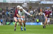 17 December 2023; Paddy Butler of O’Loughlin Gaels in action against Martin Burke of Ruairí Óg Cushendall during the AIB GAA Hurling All-Ireland Club Championship semi-final match between O'Loughlin Gaels, Kilkenny, and Ruairí Óg Cushendall, Antrim, at Páirc Tailteann in Navan, Meath. Photo by Seb Daly/Sportsfile