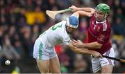17 December 2023; Seán McAfee of Ruairí Óg Cushendall and Huw Lawlor of O’Loughlin Gaels battle for possession during the AIB GAA Hurling All-Ireland Club Championship semi-final match between O'Loughlin Gaels, Kilkenny, and Ruairí Óg Cushendall, Antrim, at Páirc Tailteann in Navan, Meath. Photo by Tyler Miller/Sportsfile