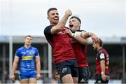 17 December 2023; Shane Daly of Munster, left, celebrates with teammate Calvin Nash after scoring their side's fourth try during the Investec Champions Cup Pool 3 Round 2 match between Exeter Chiefs and Munster at Sandy Park in Exeter, England. Photo by Brendan Moran/Sportsfile