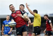 17 December 2023; Shane Daly of Munster, left, celebrates with teammate Calvin Nash after scoring their side's fourth try during the Investec Champions Cup Pool 3 Round 2 match between Exeter Chiefs and Munster at Sandy Park in Exeter, England. Photo by Brendan Moran/Sportsfile