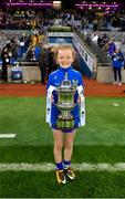 16 December 2023; Koa Peters from Ballymacarbry brings the Dolores Tyrrell Memorial Cup to the pitch before the Currentaccount.ie LGFA All-Ireland Senior Club Championship final match between Ballymacarby of Waterford and Kilkerrin-Clonberne of Galway at Croke Park in Dublin. Photo by Piaras Ó Mídheach/Sportsfile