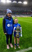 16 December 2023; Koa Peters from Ballymacarbry brings the Dolores Tyrrell Memorial Cup to the pitch before the Currentaccount.ie LGFA All-Ireland Senior Club Championship final match between Ballymacarby of Waterford and Kilkerrin-Clonberne of Galway at Croke Park in Dublin. Photo by Piaras Ó Mídheach/Sportsfile