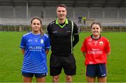 17 December 2023; Referee Ray McBride with team captains Rebecca Kean of Claremorris, left, and Lisa Harte of O'Donovan Rossa before the Currentaccount.ie LGFA All-Ireland Junior Club Championship final match between Claremorris of Mayo and O'Donovan Rossa of Cork at Parnell Park in Dublin. Photo by Ben McShane/Sportsfile