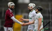17 December 2023; Neil McManus of Ruairí Óg Cushendall shakes hands with O'Loughlin Gaels players Tony Forristal, centre, and Mikey Butler after the AIB GAA Hurling All-Ireland Club Championship semi-final match between O'Loughlin Gaels, Kilkenny, and Ruairí Óg Cushendall, Antrim, at Páirc Tailteann in Navan, Meath. Photo by Seb Daly/Sportsfile