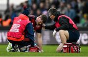17 December 2023; Jack O'Donoghue of Munster receives medical attention during the Investec Champions Cup Pool 3 Round 2 match between Exeter Chiefs and Munster at Sandy Park in Exeter, England. Photo by Brendan Moran/Sportsfile