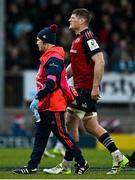 17 December 2023; Jack O'Donoghue of Munster leaves the pitch with an injury during the Investec Champions Cup Pool 3 Round 2 match between Exeter Chiefs and Munster at Sandy Park in Exeter, England. Photo by Brendan Moran/Sportsfile