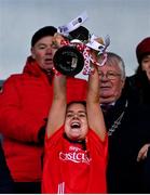 17 December 2023; O'Donovan Rossa captain Lisa Harte lifts the cup after during the Currentaccount.ie LGFA All-Ireland Junior Club Championship final match between Claremorris of Mayo and O'Donovan Rossa of Cork at Parnell Park in Dublin. Photo by Ben McShane/Sportsfile