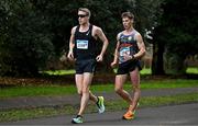17 December 2023; Veli-Matti Partanen of Finland, left, and David Kenny of Farranfore / Maine Valley, Kerry, compete in the men's 20km during the National Race Walking Championships and World Athletics Race Walking Tour Bronze at Raheny Park in Dublin. Photo by Sam Barnes/Sportsfile