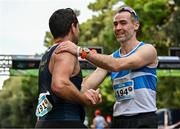 17 December 2023; John Egan of St Killian's AC, Wexford, left, is congratulated by David Kidd of St Laurence O'Toole AC, Carlow, after the masters men 10km during the National Race Walking Championships and World Athletics Race Walking Tour Bronze at Raheny Park in Dublin. Photo by Sam Barnes/Sportsfile