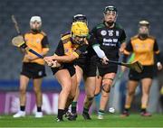 17 December 2023; Kerrie Cole of Na Fianna shoots under pressure from Rachel McCarthy of Clanmaurice during the AIB Camogie All-Ireland Intermediate Club Championship final match between Clanmaurice of Kerry and Na Fianna of Meath at Croke Park in Dublin. Photo by Piaras Ó Mídheach/Sportsfile