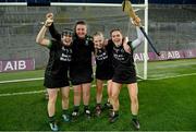 17 December 2023; Clanmaurice players, from left, Sara Murphy, Aoife Fitzgerald, Michelle Costello and Rachel McCarthy celebrate after their side's victory in the AIB Camogie All-Ireland Intermediate Club Championship final match between Clanmaurice of Kerry and Na Fianna of Meath at Croke Park in Dublin. Photo by Piaras Ó Mídheach/Sportsfile