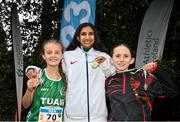 17 December 2023; Girls under 14 2km medallists Shyna Patel of USA, centre, gold, Cuisle O'Callaghan of Tuam, Galway, left, silver, and Hazel Dinkin of Clare River Harriers, right, bronze, during the National Race Walking Championships and World Athletics Race Walking Tour Bronze at Raheny Park in Dublin. Photo by Sam Barnes/Sportsfile