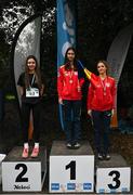 17 December 2023; Girls under 16 3km medallists, Deea Ioanovici of Romania, centre, gold, Leah O'Gara of Letterkenny, Donegal, left, silver, and Denisa Pop of Romania, right, bronze, during the National Race Walking Championships and World Athletics Race Walking Tour Bronze at Raheny Park in Dublin. Photo by Sam Barnes/Sportsfile
