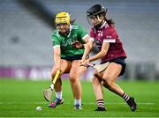 17 December 2023; Shannon Corcoran of Sarsfields in action against Katie Byrne of Dicksboro during the AIB Camogie All-Ireland Senior Club Championship final match between Dicksboro of Kilkenny and Sarsfields of Galway at Croke Park in Dublin. Photo by Piaras Ó Mídheach/Sportsfile