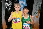 17 December 2023; Boys under 14 2km medallists, Sean Walsh of Adamstown, left, gold, and Grofu Newell of Tuam, Galway, right, bronze, during the National Race Walking Championships and World Athletics Race Walking Tour Bronze at Raheny Park in Dublin. Photo by Sam Barnes/Sportsfile