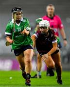 17 December 2023; Siobhán McGrath of Sarsfields in action against Jane Cass of Dicksboro during the AIB Camogie All-Ireland Senior Club Championship final match between Dicksboro of Kilkenny and Sarsfields of Galway at Croke Park in Dublin. Photo by Stephen Marken/Sportsfile