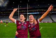 17 December 2023; Dicksboro Orla Hanrick, left, and Jane Cass celebrate after their side's victory in the AIB Camogie All-Ireland Senior Club Championship final match between Dicksboro of Kilkenny and Sarsfields of Galway at Croke Park in Dublin. Photo by Piaras Ó Mídheach/Sportsfile