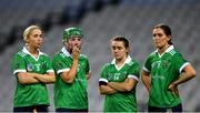 17 December 2023; Sarsfields players from left, Laura Ward, Sarah Spellman, Siobhán McGrath, and Orlaith McGrath after their side's defeat in the AIB Camogie All-Ireland Senior Club Championship final match between Dicksboro of Kilkenny and Sarsfields of Galway at Croke Park in Dublin. Photo by Stephen Marken/Sportsfile