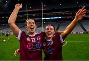 17 December 2023; Dicksboro players Orla Hanrick, left, and Jane Cass celebrates after their side's victory in the AIB Camogie All-Ireland Senior Club Championship final match between Dicksboro of Kilkenny and Sarsfields of Galway at Croke Park in Dublin. Photo by Piaras Ó Mídheach/Sportsfile