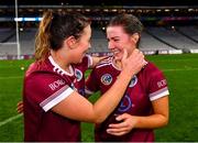 17 December 2023; Dicksboro players Orla Hanrick, left, and Jane Cass celebrate after their side's victory in the AIB Camogie All-Ireland Senior Club Championship final match between Dicksboro of Kilkenny and Sarsfields of Galway at Croke Park in Dublin. Photo by Piaras Ó Mídheach/Sportsfile