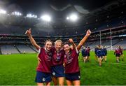 17 December 2023; Dicksboro players, from left, Aobha O’Gorman, Bronagh Doheny and Jane Cass celebrate after their side's victory in the AIB Camogie All-Ireland Senior Club Championship final match between Dicksboro of Kilkenny and Sarsfields of Galway at Croke Park in Dublin. Photo by Piaras Ó Mídheach/Sportsfile