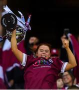 17 December 2023; Dicksboro captain Jenny Clifford lifts the Bill & Agnes Carroll Cup after her side's victory in the AIB Camogie All-Ireland Senior Club Championship final match between Dicksboro of Kilkenny and Sarsfields of Galway at Croke Park in Dublin. Photo by Piaras Ó Mídheach/Sportsfile