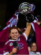 17 December 2023; Dicksboro captain Jenny Clifford lifts the Bill & Agnes Carroll Cup after her side's victory in the AIB Camogie All-Ireland Senior Club Championship final match between Dicksboro of Kilkenny and Sarsfields of Galway at Croke Park in Dublin. Photo by Piaras Ó Mídheach/Sportsfile