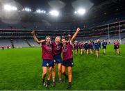 17 December 2023; Dicksboro players, from left, Aobha O’Gorman, Bronagh Doheny and Jane Cass celebrate after their side's victory in the AIB Camogie All-Ireland Senior Club Championship final match between Dicksboro of Kilkenny and Sarsfields of Galway at Croke Park in Dublin. Photo by Piaras Ó Mídheach/Sportsfile