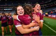 17 December 2023; Dicksboro players from left, Danielle Kenny, Caoimhe Dowling and Lucinda Gahan celebrate after their side's victory in the AIB Camogie All-Ireland Senior Club Championship final match between Dicksboro of Kilkenny and Sarsfields of Galway at Croke Park in Dublin. Photo by Piaras Ó Mídheach/Sportsfile