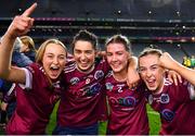 17 December 2023; Dicksboro players, from left, Aisling Browne, Ciara O’Shea, Jane Cass and Ciara Phelan celebrate after their side's victory in the AIB Camogie All-Ireland Senior Club Championship final match between Dicksboro of Kilkenny and Sarsfields of Galway at Croke Park in Dublin. Photo by Piaras Ó Mídheach/Sportsfile