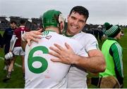 17 December 2023; O'Loughlin Gaels players Conor Heary, right, and Paddy Deegan celebrate after their side's victory in the AIB GAA Hurling All-Ireland Club Championship semi-final match between O'Loughlin Gaels, Kilkenny, and Ruairí Óg Cushendall, Antrim, at Páirc Tailteann in Navan, Meath. Photo by Seb Daly/Sportsfile