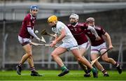 17 December 2023; Cian Loy of O’Loughlin Gaels in action against Neil McManus of Ruairí Óg Cushendall, right, during the AIB GAA Hurling All-Ireland Club Championship semi-final match between O'Loughlin Gaels, Kilkenny, and Ruairí Óg Cushendall, Antrim, at Páirc Tailteann in Navan, Meath. Photo by Seb Daly/Sportsfile