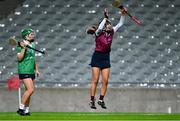 17 December 2023; Rose Kelly of Dicksboro celebrates after her side's victory as Reitseal Kelly of Sarsfields looks on in the AIB Camogie All-Ireland Senior Club Championship final match between Dicksboro of Kilkenny and Sarsfields of Galway at Croke Park in Dublin. Photo by Piaras Ó Mídheach/Sportsfile