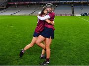 17 December 2023; Dicksboro players Rose Kelly, right, and Eva Healy celebrate after their side's victory in the AIB Camogie All-Ireland Senior Club Championship final match between Dicksboro of Kilkenny and Sarsfields of Galway at Croke Park in Dublin. Photo by Piaras Ó Mídheach/Sportsfile