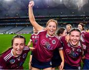 17 December 2023; Dicksboro players, from left, Aobha O’Gorman, Tara Clifford and Jane Cass celebrate after their side's victory in the AIB Camogie All-Ireland Senior Club Championship final match between Dicksboro of Kilkenny and Sarsfields of Galway at Croke Park in Dublin. Photo by Piaras Ó Mídheach/Sportsfile
