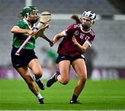 17 December 2023; Tara Kenny of Sarsfields in action against Asha McHardy of Dicksboro during the AIB Camogie All-Ireland Senior Club Championship final match between Dicksboro of Kilkenny and Sarsfields of Galway at Croke Park in Dublin. Photo by Piaras Ó Mídheach/Sportsfile