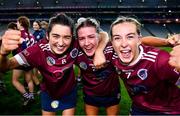 17 December 2023; Dicksboro players, from left, Ciara O’Shea, Jane Cass and Ciara Phelan celebrate after their side's victory in the AIB Camogie All-Ireland Senior Club Championship final match between Dicksboro of Kilkenny and Sarsfields of Galway at Croke Park in Dublin. Photo by Piaras Ó Mídheach/Sportsfile