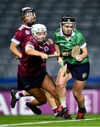 17 December 2023; Siobhán McGrath of Sarsfields in action against Jane Cass of Dicksboro during the AIB Camogie All-Ireland Senior Club Championship final match between Dicksboro of Kilkenny and Sarsfields of Galway at Croke Park in Dublin. Photo by Piaras Ó Mídheach/Sportsfile