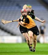 17 December 2023; Sophia Payne of Na Fianna in action against Kate Lynch of Clanmaurice during the AIB Camogie All-Ireland Intermediate Club Championship final match between Clanmaurice of Kerry and Na Fianna of Meath at Croke Park in Dublin. Photo by Piaras Ó Mídheach/Sportsfile