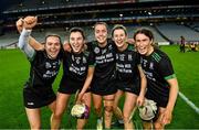 17 December 2023; Clanmaurice players, from left, Rachel McCarthy, Niamh Leen, Danielle O’Leary, Ann Marie Leen and Aoife Behan celebrate after their side's victory in the AIB Camogie All-Ireland Intermediate Club Championship final match between Clanmaurice of Kerry and Na Fianna of Meath at Croke Park in Dublin. Photo by Piaras Ó Mídheach/Sportsfile