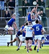 22 October 2023; Johnny Doyle and Johnny Byrne of Allenwood in action against David Keating of Castledermot during the Kildare County Intermediate Club Football Championship final between Castledermot and Allenwood at Netwatch Cullen Park in Carlow. Photo by Piaras Ó Mídheach/Sportsfile