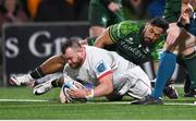22 December 2023; Andrew Warwick of Ulster dives over to score his side's first try despite the tackle of Bundee Aki of Connacht during the United Rugby Championship match between Ulster and Connacht at Kingspan Stadium in Belfast. Photo by Ramsey Cardy/Sportsfile