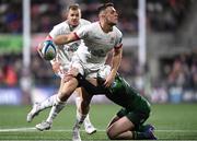 22 December 2023; James Hume of Ulster is tackled by Mack Hansen of Connacht during the United Rugby Championship match between Ulster and Connacht at Kingspan Stadium in Belfast. Photo by Ramsey Cardy/Sportsfile