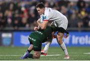 22 December 2023; Jacob Stockdale of Ulster is tackled by Mack Hansen of Connacht during the United Rugby Championship match between Ulster and Connacht at Kingspan Stadium in Belfast. Photo by Ramsey Cardy/Sportsfile