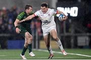 22 December 2023; Jacob Stockdale of Ulster is tackled by Jack Carty of Connacht during the United Rugby Championship match between Ulster and Connacht at Kingspan Stadium in Belfast. Photo by Ramsey Cardy/Sportsfile