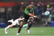 22 December 2023; Bundee Aki of Connacht is tackled by James Hume of Ulster during the United Rugby Championship match between Ulster and Connacht at Kingspan Stadium in Belfast. Photo by Ramsey Cardy/Sportsfile