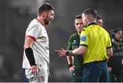 22 December 2023; Referee Eoghan Cross speaks to captains Iain Henderson of Ulster and Jack Carty of Connacht during the United Rugby Championship match between Ulster and Connacht at Kingspan Stadium in Belfast. Photo by Ramsey Cardy/Sportsfile