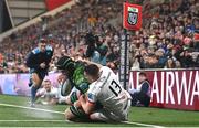 22 December 2023; Shamus Hurley-Langston of Connacht scores his side's second try despite the tackle of James Hume of Ulster during the United Rugby Championship match between Ulster and Connacht at Kingspan Stadium in Belfast. Photo by Ramsey Cardy/Sportsfile