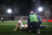 22 December 2023; James Hume of Ulster is treated for an injury during the United Rugby Championship match between Ulster and Connacht at Kingspan Stadium in Belfast. Photo by Ramsey Cardy/Sportsfile